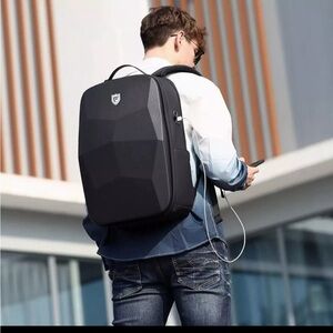 Black hard shell laptop backpack